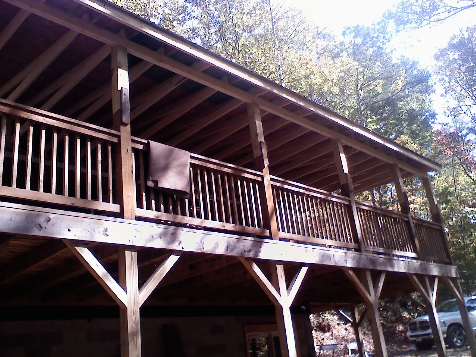 Timber framing under a new elevated porch and deck — Roof Leak Repair in North Chicago by Roofing Brothers